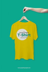 Free-Female-Holding-T-Shirt-Mockup-PSD