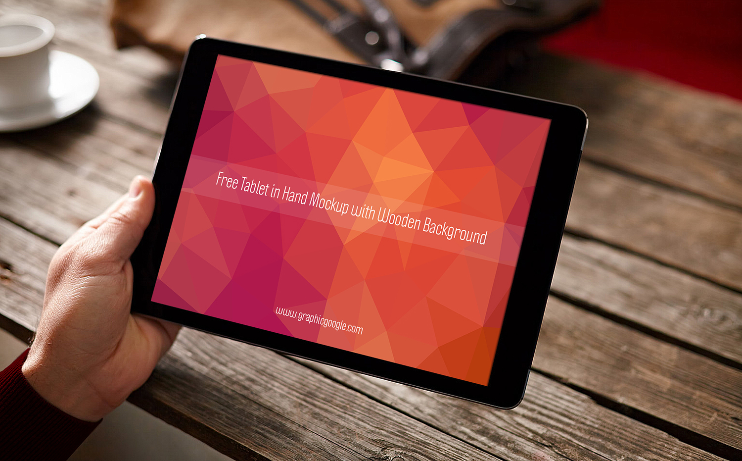 Free Tablet in Hand Mockup with Wooden Background-Preview Image